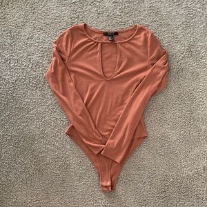 Rust long sleeve body suit